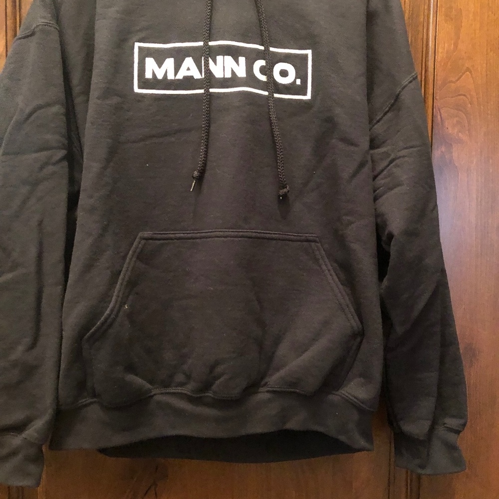 Heavy duty hoodie branded 'Mann Company'